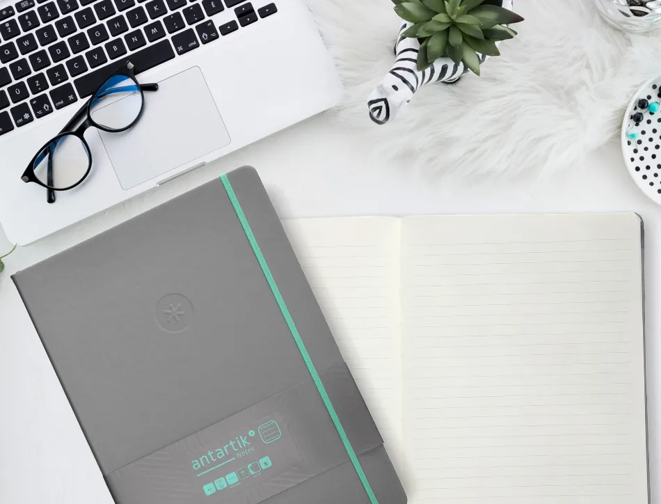 Carnet fermeture elastique turquoise antartik notes couverture rigide a4 ligne 100feuilles 80gr fsc coloris gris