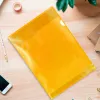 Pochette coin q-connect polypropylène grainé économique 12/100e coloris jaune transparent boîte 100 unités